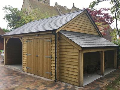 Pic 23. 3.0m x 5.4m Carriage House, 3.0m x 5.4m Garage & 1.2m x 5.2m Log Store with slate roof